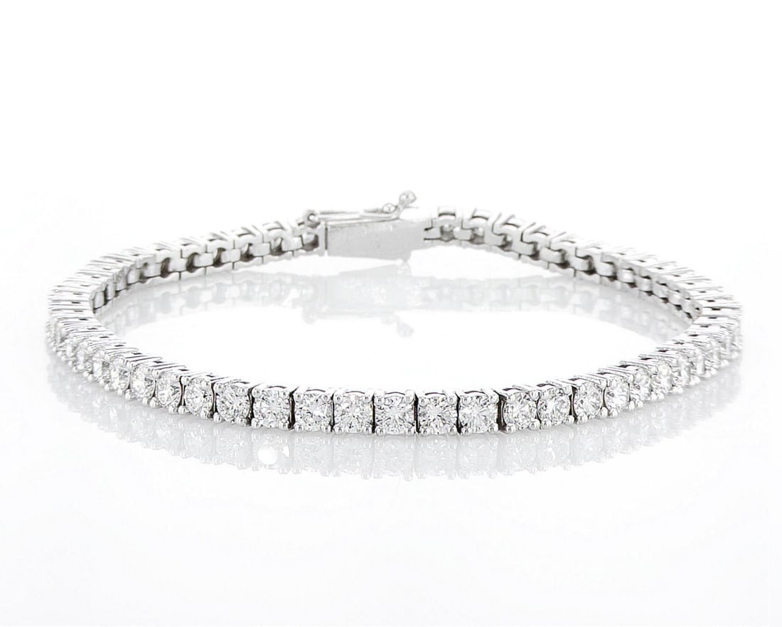 14kt White Gold 6.97ctw Diamond Bracelet: Jewelry Description Description: One 14k white gold bracelet, set with lab grown diamonds. Jewelry Weight: 13.03 Grs Total Diamonds Weight: 6.97 Cts Precious Metal: 14kt White Gold Certificate Number:
