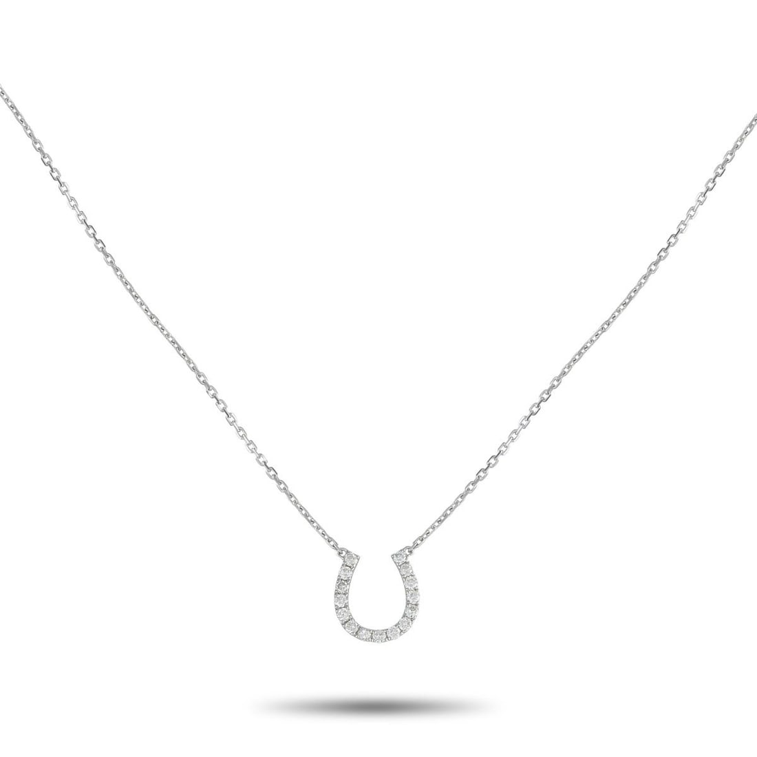 14K WHITE GOLD 0.30CT DIAMOND HORSESHOE NECKLACE: This exquisitely crafted necklace is poised to bring you plenty of good luck. A horseshoe shaped pendant measuring 0.50 long by 0.40 wide shines to life thanks to a series of sparkling Diamonds totali