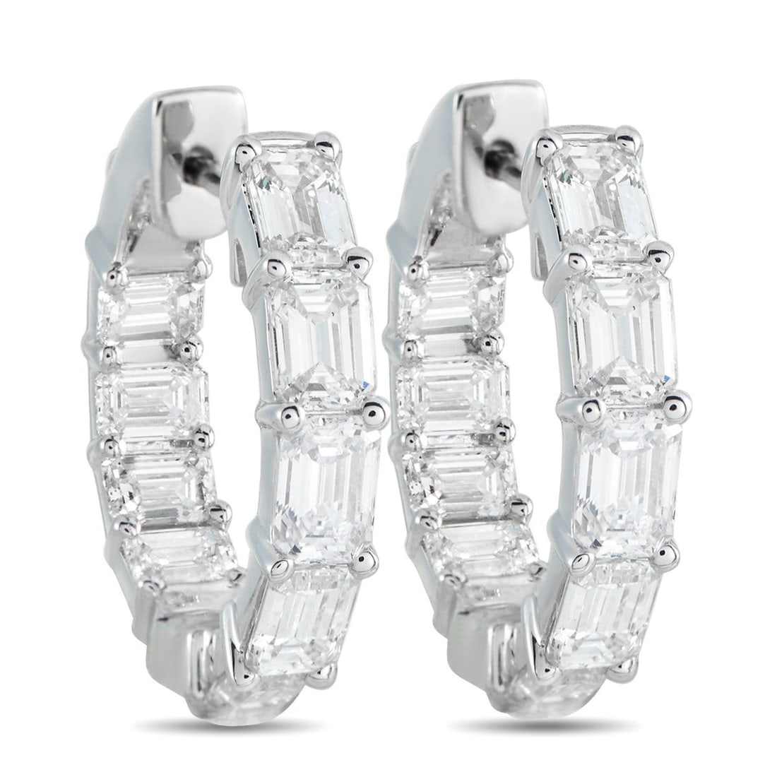 18K WHITE GOLD 3.80CT DIAMOND INSIDE-OUT HOOP EARRINGS: A fresh perspective on a classic. These 18k white gold hoops feature baguette diamonds in shared prongs, arranged with clear intent. Along the outer front edge, the diamonds are placed north-south to 