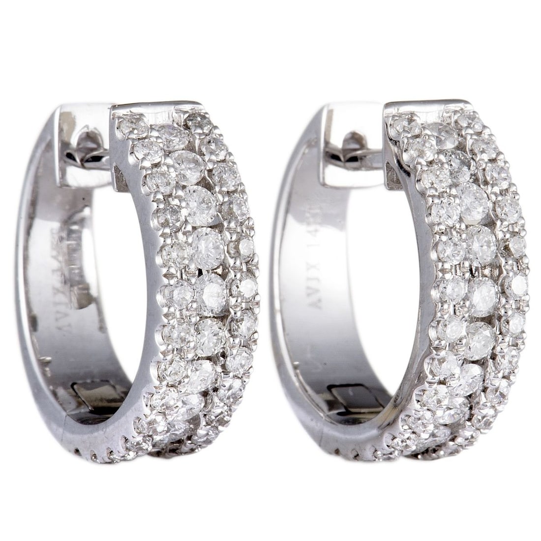 14K WHITE GOLD 1.00 CT DIAMOND HOOP EARRINGS: This pair of huggie earrings glisten with elegance and delicate diamonds. The earrings are made of 14K white gold and are set with ~.98ct of diamonds. Category: Earring Condition: Brand New Gender: La