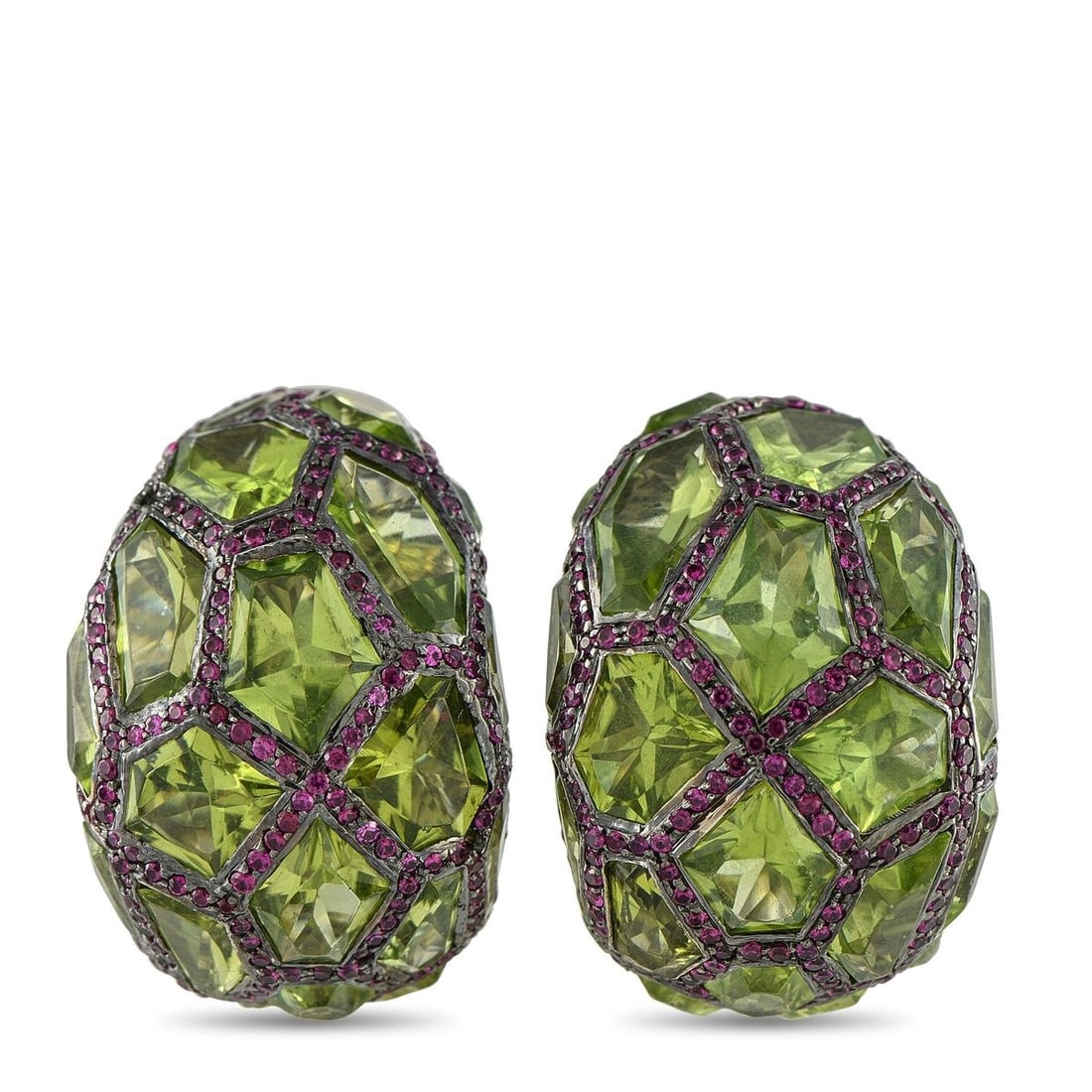 DE GRISOGONO 18K WHITE GOLD RUBY AND PERIDOT EARRINGS: These De Grisogono earrings are a celebration of color. Bold Peridot gemstones make them incredibly eye-catching, while veins of inset Ruby gemstones provide delightful contrast. Each one features an 