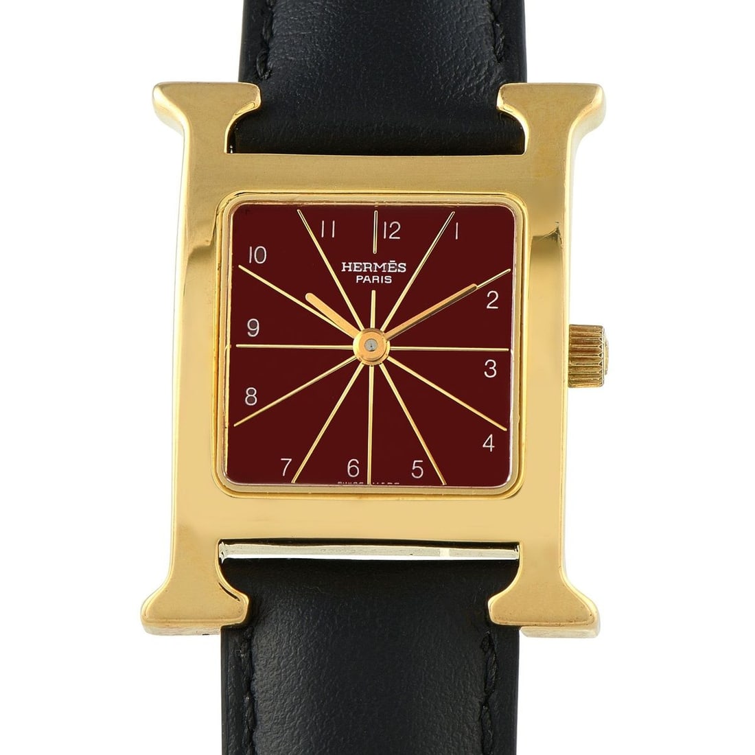 HERMES HEURE H RED DIAL GOLD PLATED STEEL QUARTZ WATCH: In this particular Herms Heure ref. HH1.201 watch, the iconic H-shaped case is paired with a vivid red dial detailed with gold-toned baton hands and fine radiating lines. Thin yet crisp Arabic numeral