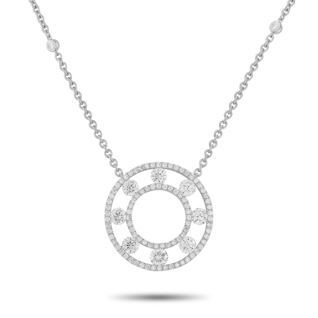 18K WHITE GOLD 1.70CT DIAMOND NECKLACE: This luminous necklace will inspire endless compliments. Diamonds with a total weight of 1.70 carats cover this pieces circular pendant and extend onto the delicate 17 chain. The pendant measures 1.19