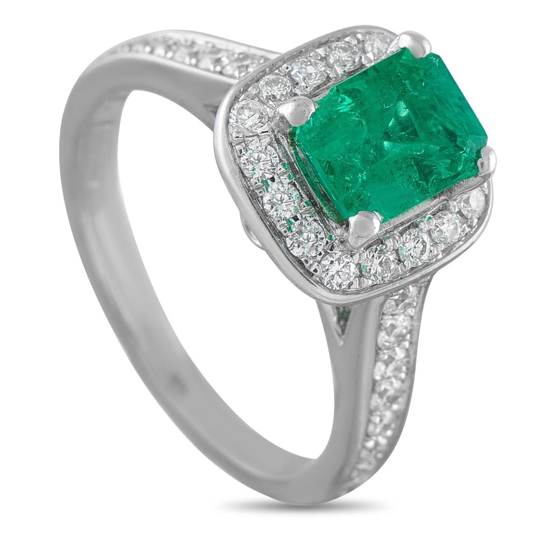 18K WHITE GOLD 0.51CT DIAMOND AND EMERALD RING: Ideal for everyday wear, this luxury ring will add a stylish pop of color to any ensemble. A 1.40 carat Emerald makes a statement at the center of this pieces 18K White Gold setting. Diamond accents t