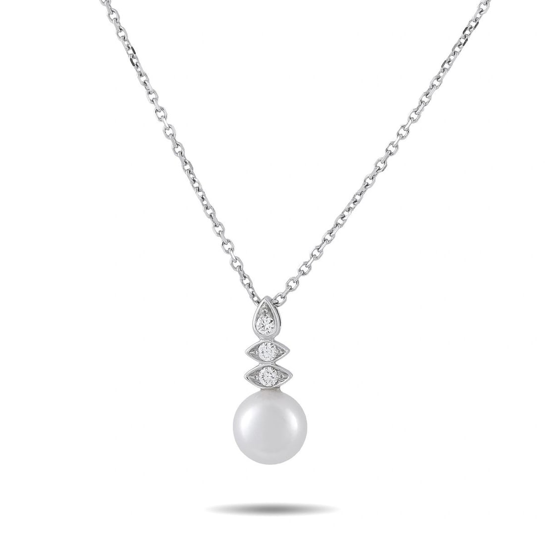 ASSAEL 18K WHITE GOLD 0.11CT DIAMOND AND PEARL DROP NECKLACE: This Assael necklace is set in 18K white gold and features a lustrous 8mm cultured pearl accented by a trio of diamonds totaling approximately 0.11 carats set above the pearl. The pendant measures app