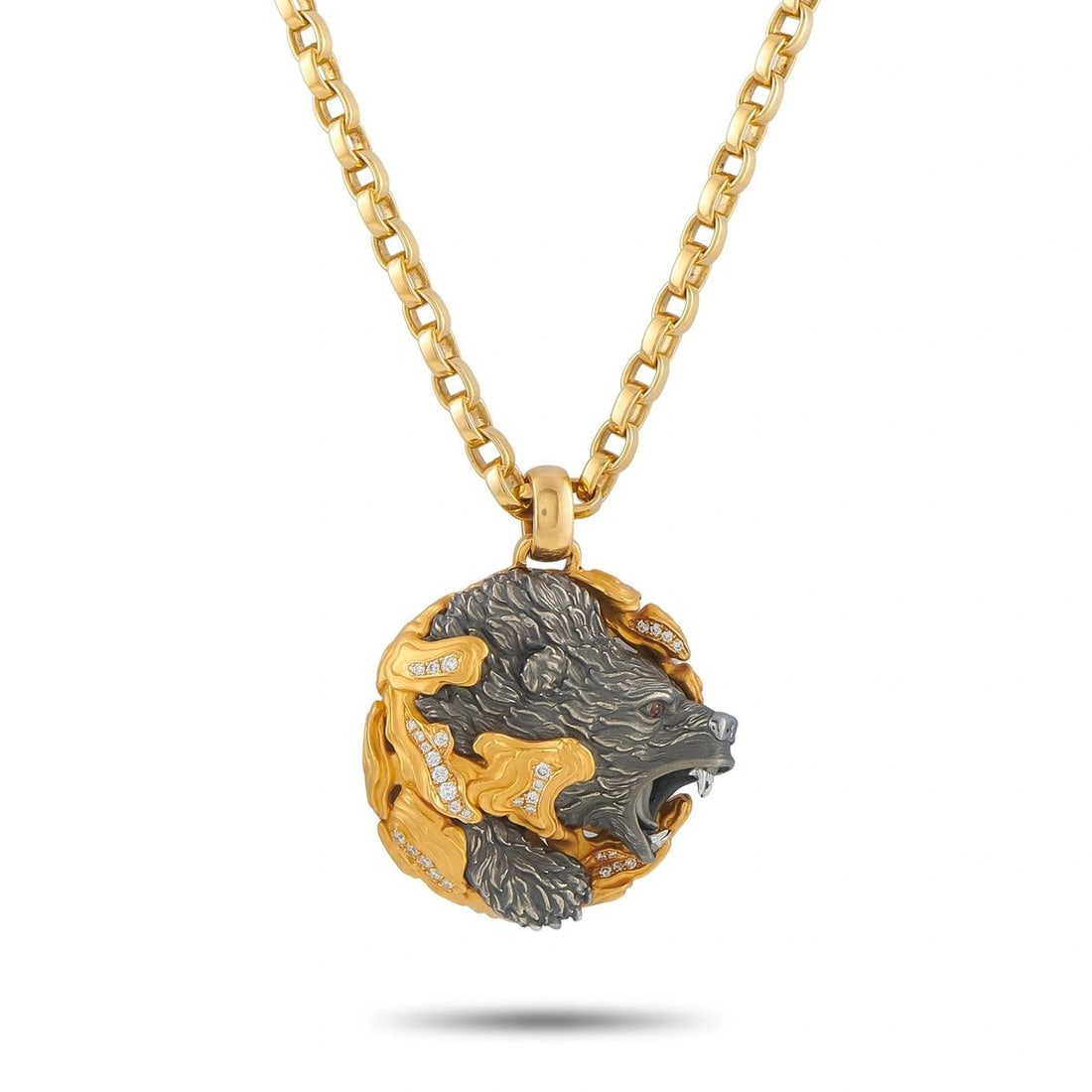 MAGERIT 18K YELLOW GOLD DIAMOND BEAR PENDANT NECKLACE: This Magerit necklace is incredibly bold. A piece that draws inspiration from nature, the organic 18K Yellow Gold metalwork beautifully showcases the central bear motif. Diamond accents provide an add