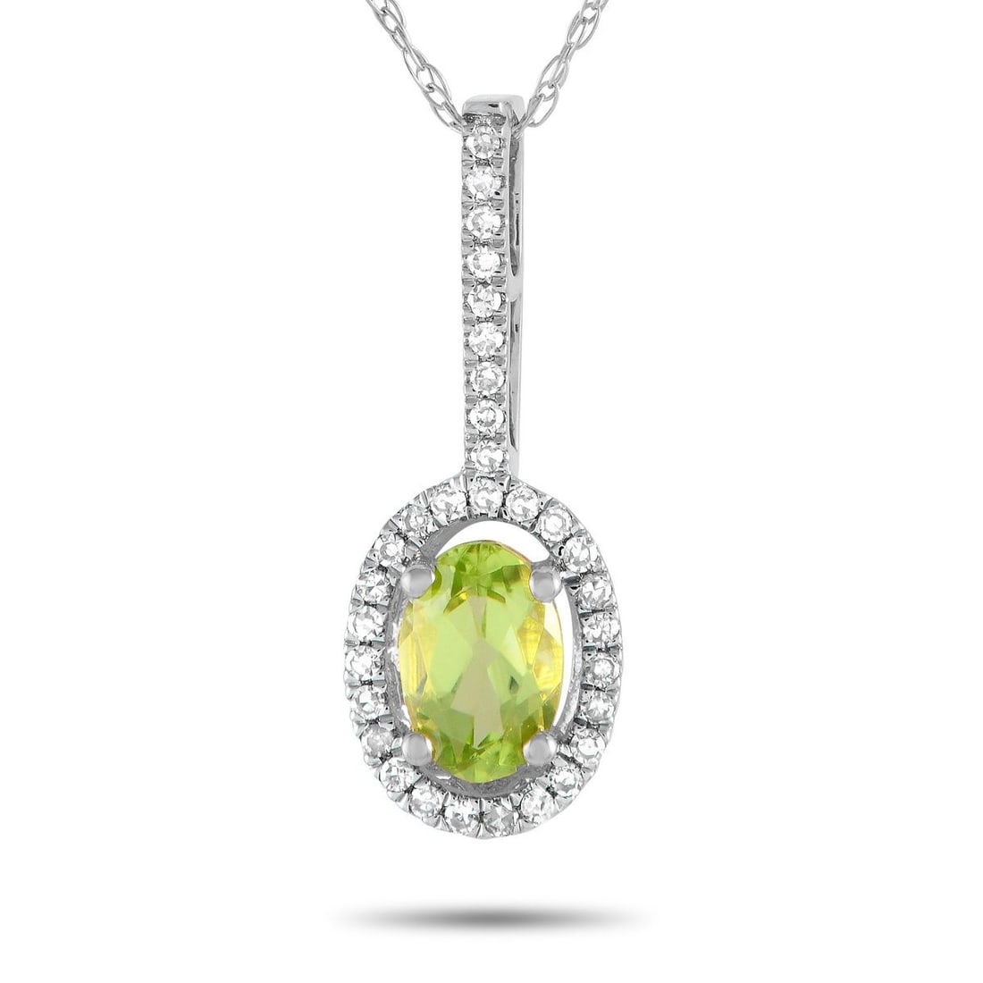 14K WHITE GOLD 0.09CT DIAMOND AND PERIDOT PEDANT NECKLACE: This simple, elegant necklace is ideal for anyone with a minimalist aesthetic. Suspended from an 18 chain, youll find a 14K White Gold pendant measuring 0.75 long by 0.25 wide. It comes complete with 