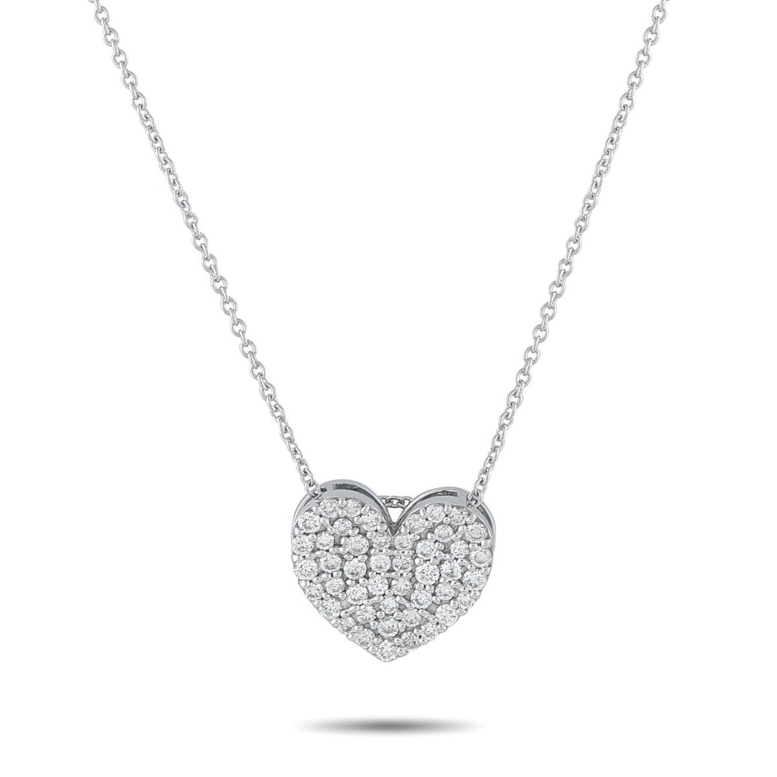 18K WHITE GOLD 0.54CT DIAMOND HEART NECKLACE: A sparkling heart-shaped pendant makes a statement at the center of this elegant necklace. Set in 18K White Gold, Diamonds totaling 0.54 carats make it simply stunning. The pendant measures 0.50 round