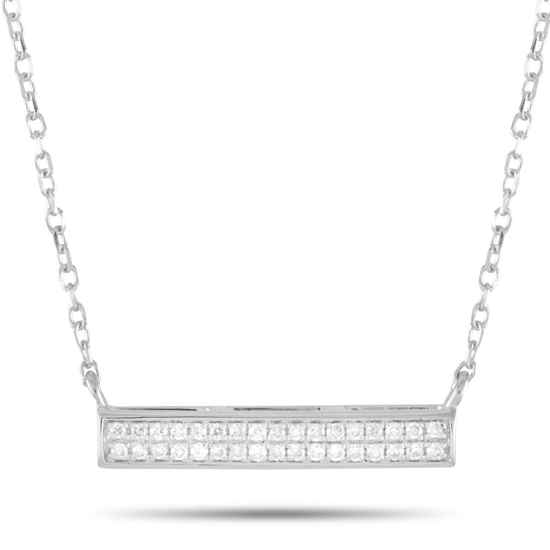14K WHITE GOLD 0.10 CT DIAMOND PENDANT NECKLACE: This necklace is crafted from 14K white gold and weighs 1.5 grams. It is presented with a 15 chain and boasts a pendant that measures 0.13 in length and 0.63 in width. The necklace is set with diamond