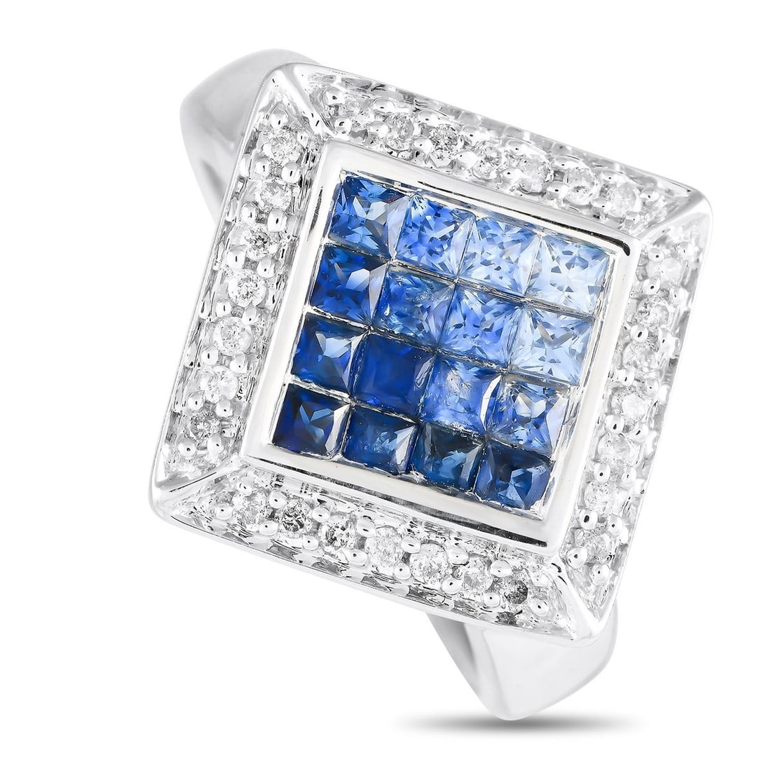 14K WHITE GOLD 0.20CT DIAMOND AND SAPPHIRE RING: A captivating arrangement of Sapphires totaling 1.05 carats make a statement at the center of this exquisite ring. Perfect for even your most special occasions, sparkling Diamonds with a total weight 