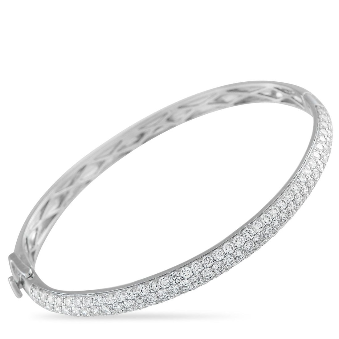 14K WHITE GOLD 3.75CT DIAMOND PAVE BANGLE BRACELET: Expect a bright, icy shine from this bangle adorned with 3.75 carats of pav diamonds. Set on a white gold base, the stones blend into the metal, creating a seamless sweep of light across the wrist. Th