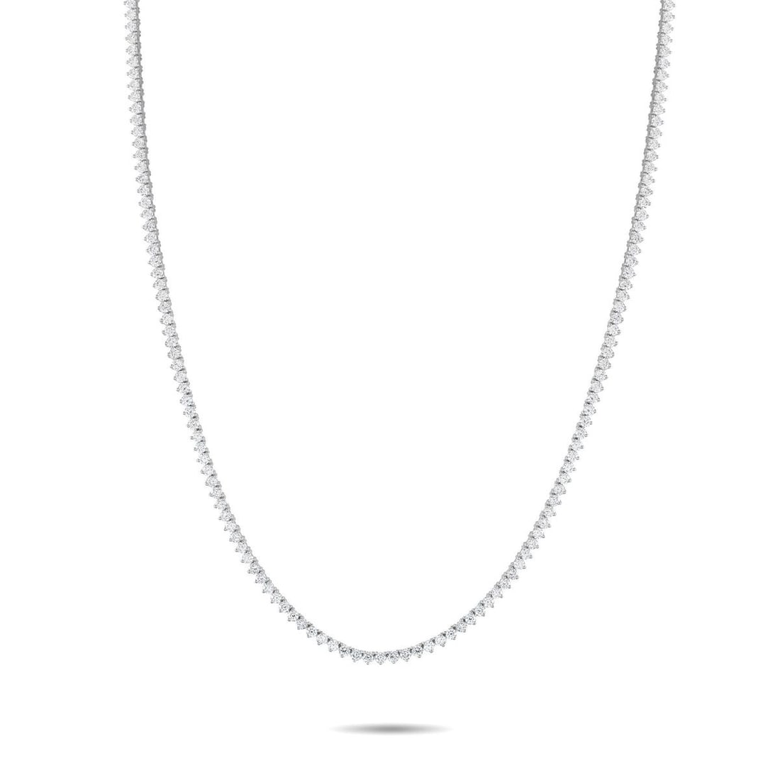14K WHITE GOLD 7.25CT LAB-GROWN DIAMOND TENNIS NECKLACE: A series of sparkling Lab Grown Diamonds with a total weight of 7.25 carats make this tennis necklace endlessly impressive. Set in 14K White Gold, it measures 18 long and includes secure clasp closure