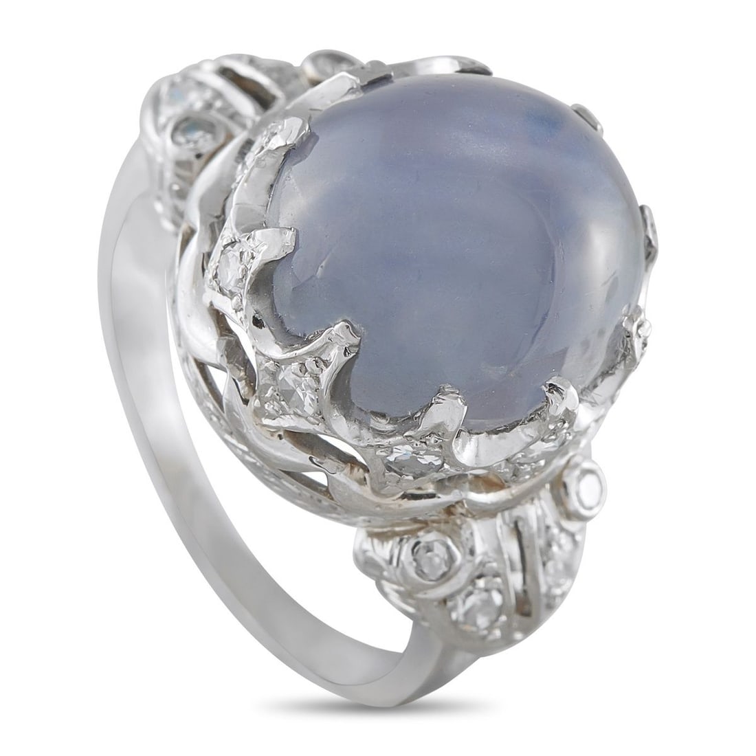 PLATINUM 0.20CT DIAMOND AND STAR SAPPHIRE ART DECO RING: This Art Deco ring is simply unforgettable. At the center, a 14.11 carat Star Sapphire adds a captivating pop of color. Diamond accents totaling 0.20 carats add additional sparkle to the overall desig