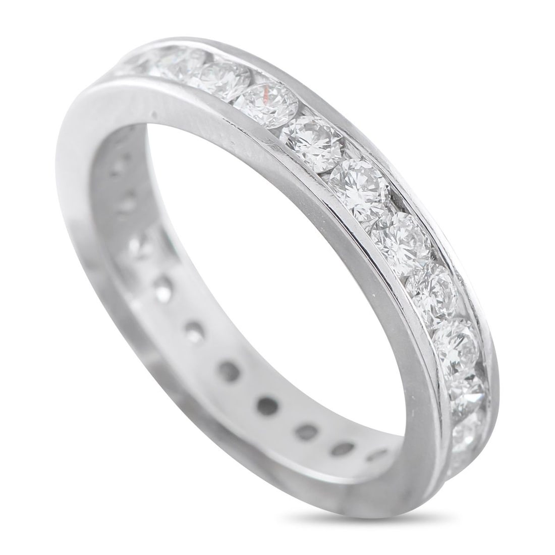 PLATINUM 1.50CT DIAMOND ETERNITY BAND RING: Channel-set Diamonds with a total weight of 1.50 carats encircle the entirety of this eternity band. Set in Platinum, this radiant ring measures 4mm wide and features a 3mm top height allowing it to