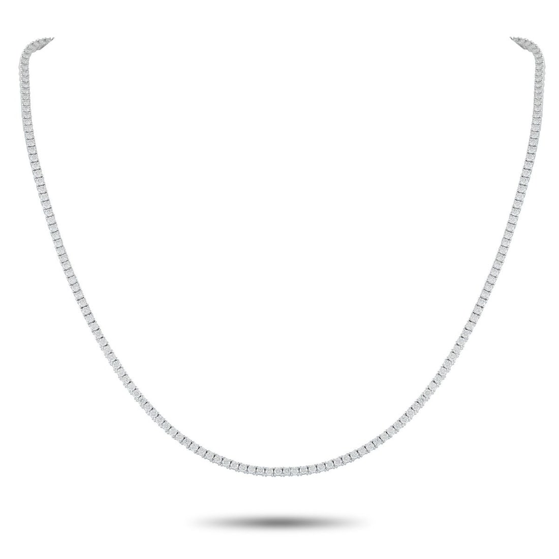 18K WHITE GOLD 5.78CT DIAMOND TENNIS NECKLACE: This sleek, sophisticated tennis necklace will never go out of style. Set in 18K White Gold, a series of sparkling Diamonds totaling 5.78 carats makes it a luxury piece that will effortlessly elevate 