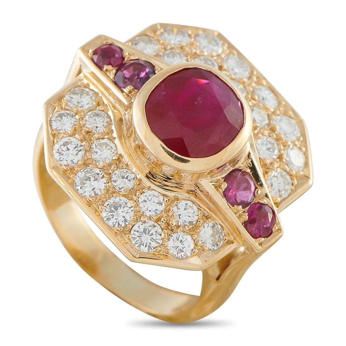 18K YELLOW GOLD 1.50CT RUBY ART DECO RING: Rooted in Deco geometry, this ring reworks the octagon with a bit of asymmetry. The eight-sided centerpiece features wider lateral edges, creating a unique footprint on the finger. Its surface is a co
