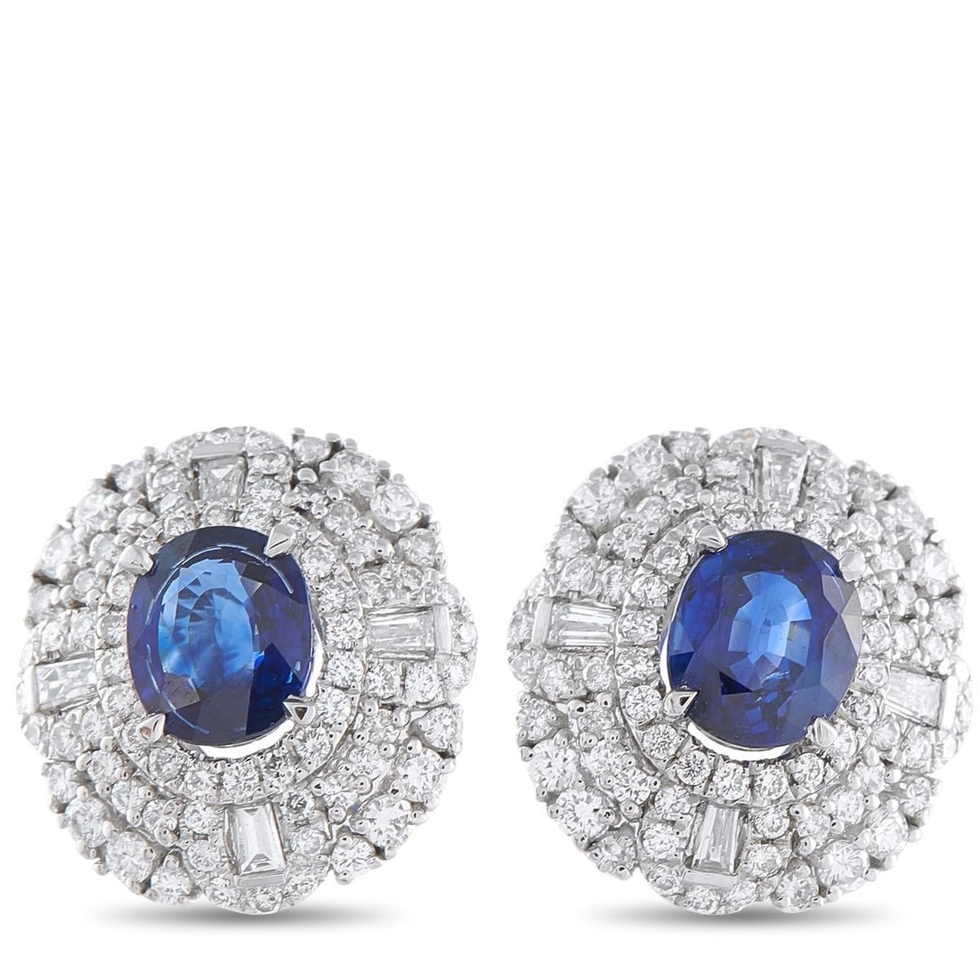 PLATINUM 1.39CT DIAMOND AND SAPPHIRE EARRINGS: Vibrant Sapphire gemstones with a total weight of 2.53 carats make a statement at the center of these circular earrings. Set in Platinum, dazzling Diamonds with a total weight of 1.39 carats make them
