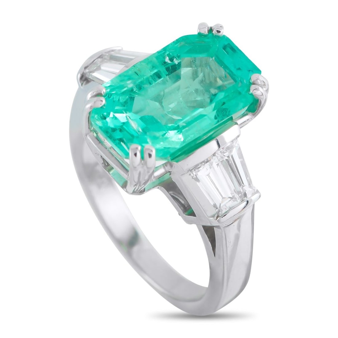 PLATINUM 0.50CT DIAMOND AND EMERALD RING: This luxury ring is designed to make a statement. Set in Platinum, it includes a vibrant 5.34 carat Emerald surrounded by sparkling Diamond accents totaling 0.50 carats. It features a 2mm wide band an
