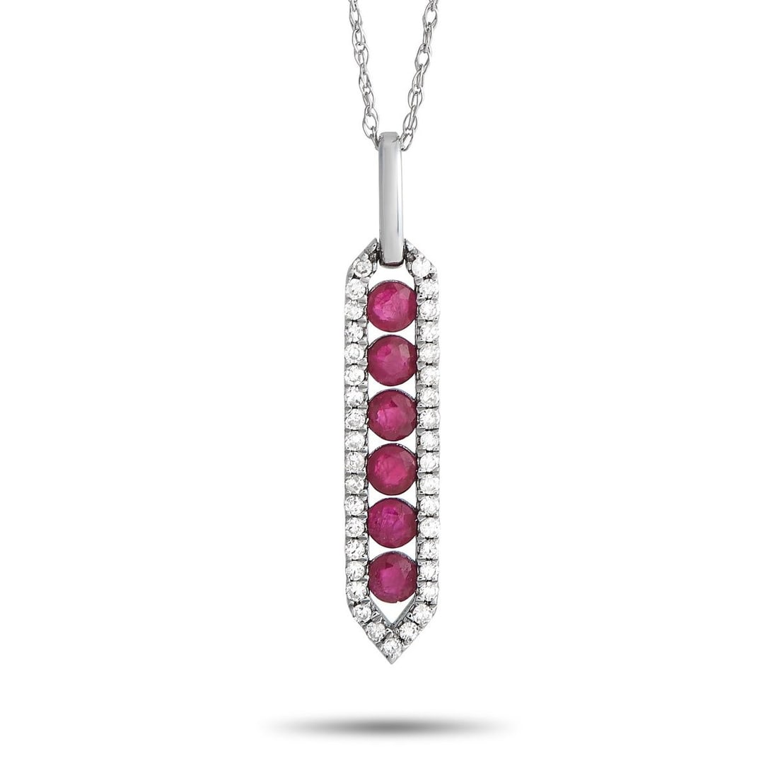 14K WHITE GOLD 0.16CT DIAMOND AND RUBY PENDANT NECKLACE: Put on this diamond and ruby necklace and let your look sparkle with a statement. This 14K white gold piece has a 17 long cable chain with a spring ring clasp. A chic pendant with six faceted rubies s