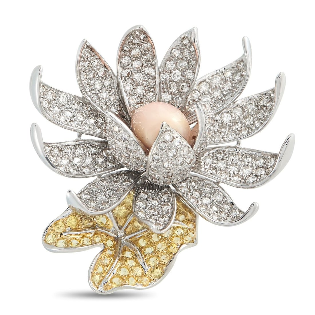18K WHITE GOLD 5.84CT DIAMOND AND CONCH PEARL FLOWER BROOCH: This artistic brooch is bold and breathtaking in design. The dimensional floral motif comes to life thanks to a stunning 6.52 carat Conch Pearl center stone. Sparkling white and yellow Diamonds with a
