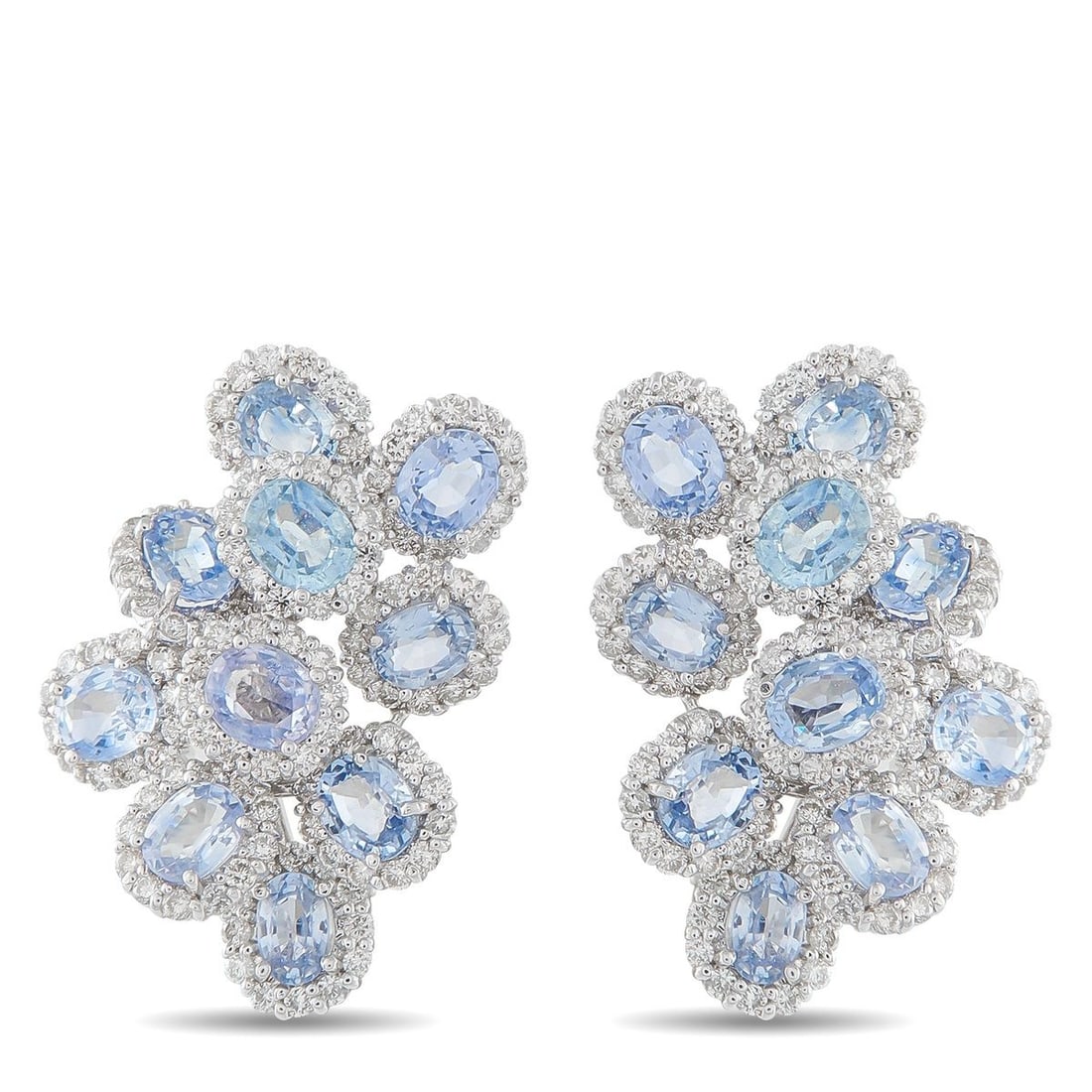 18K WHITE GOLD 3.0CT DIAMOND AND SAPPHIRE CLIP-ON EARRINGS: These luxury earrings will add a stylish pop of color to any ensemble. Elevated enough for even your most special occasions, Sapphires totaling 10.0 carats make them instantly eye-catching. Diamond ac
