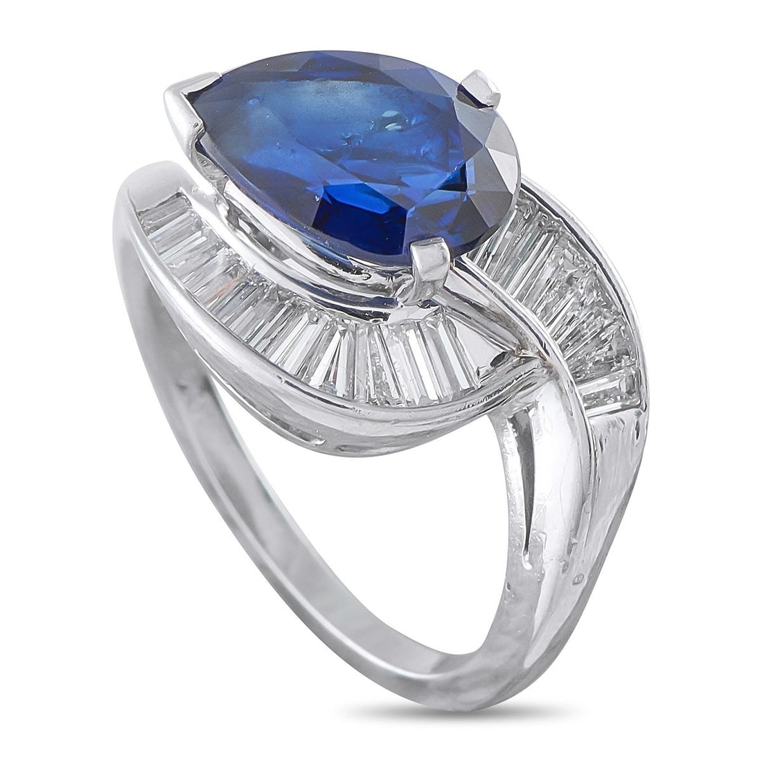 PLATINUM 1.0CT DIAMOND AND SAPPHIRE RING: This luxury ring is incredibly bold. A 3.86 carat pear-shaped Sapphire makes a statement at the center, while Diamond accents totaling 1.0 carats further elevate the design. Set in Platinum, it featur