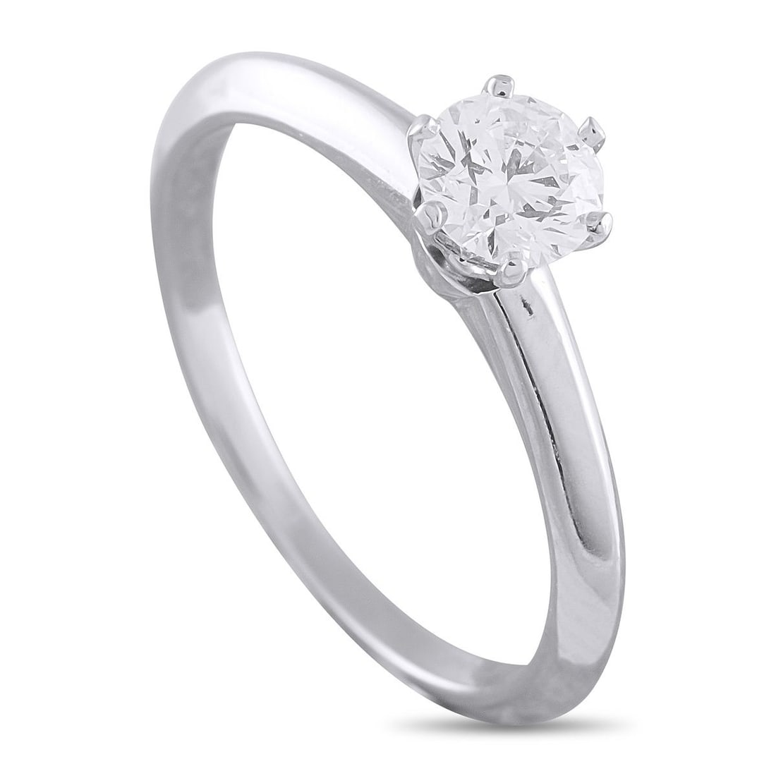 TIFFANY & CO. PLATINUM 0.38CT DIAMOND SOLITAIRE RING: This Tiffany & Co. solitaire ring will continually impress. Featuring a 0.38 carat round-cut Diamond center stone in a 6-prong setting, this classic design will simply never go out of style. Set in Pl