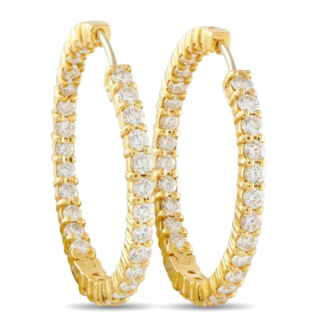 ROBERTO COIN 18K YELLOW GOLD 2.85CT DIAMOND HOOP EARRINGS: These Roberto Coin hoop earrings will add a touch of timeless elegance to any ensemble. The chic inside-out design effortlessly catches the light from every angle thanks to sparkling Diamonds with a t