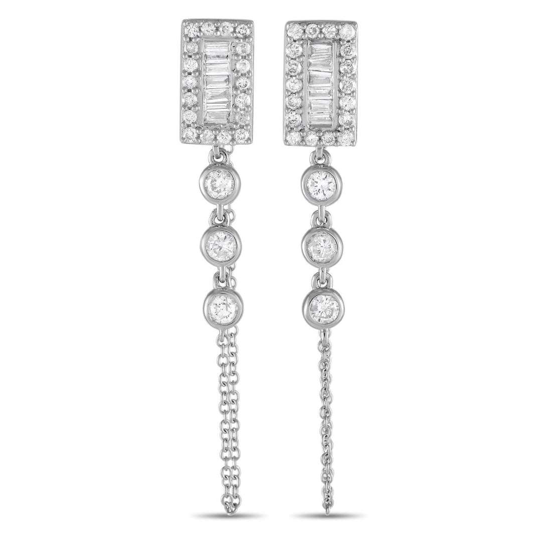 14K WHITE GOLD 0.60CT DIAMOND DANGLE EARRINGS: An array of sparkling diamonds with a total weight of 0.60 carats make these elegant earrings simply unforgettable. The 14K white gold setting measures 1.5 long by 0.20 wide and is elevated by a delic