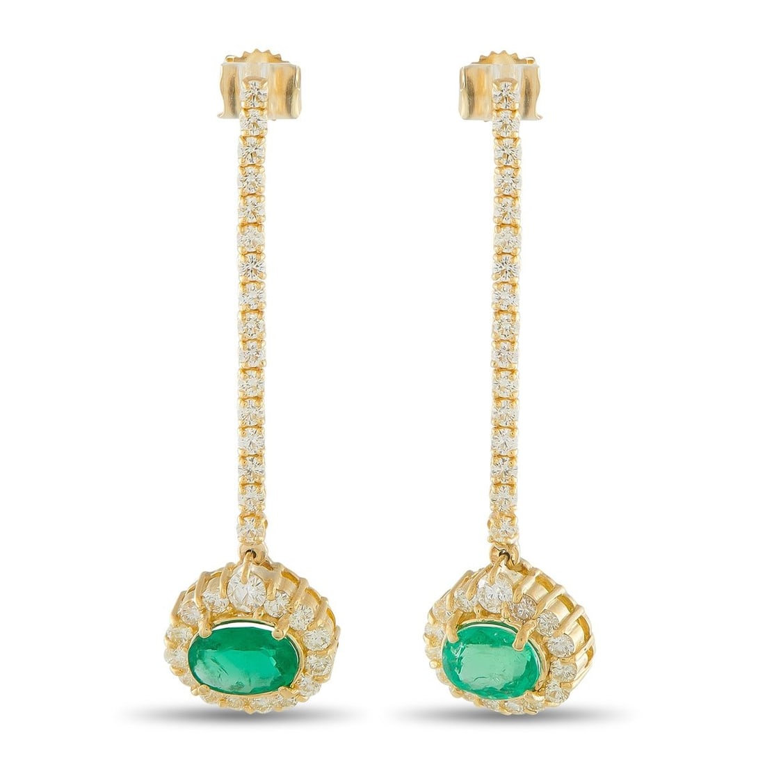 18K YELLOW GOLD 1.95CT DIAMOND AND EMERALD DROP EARRINGS: These earrings bridge the gap between historic technique and modern high-fashion. Descending from the post is a vertical line of diamonds that leads to a vibrant oval emerald drop. Set east-west to br