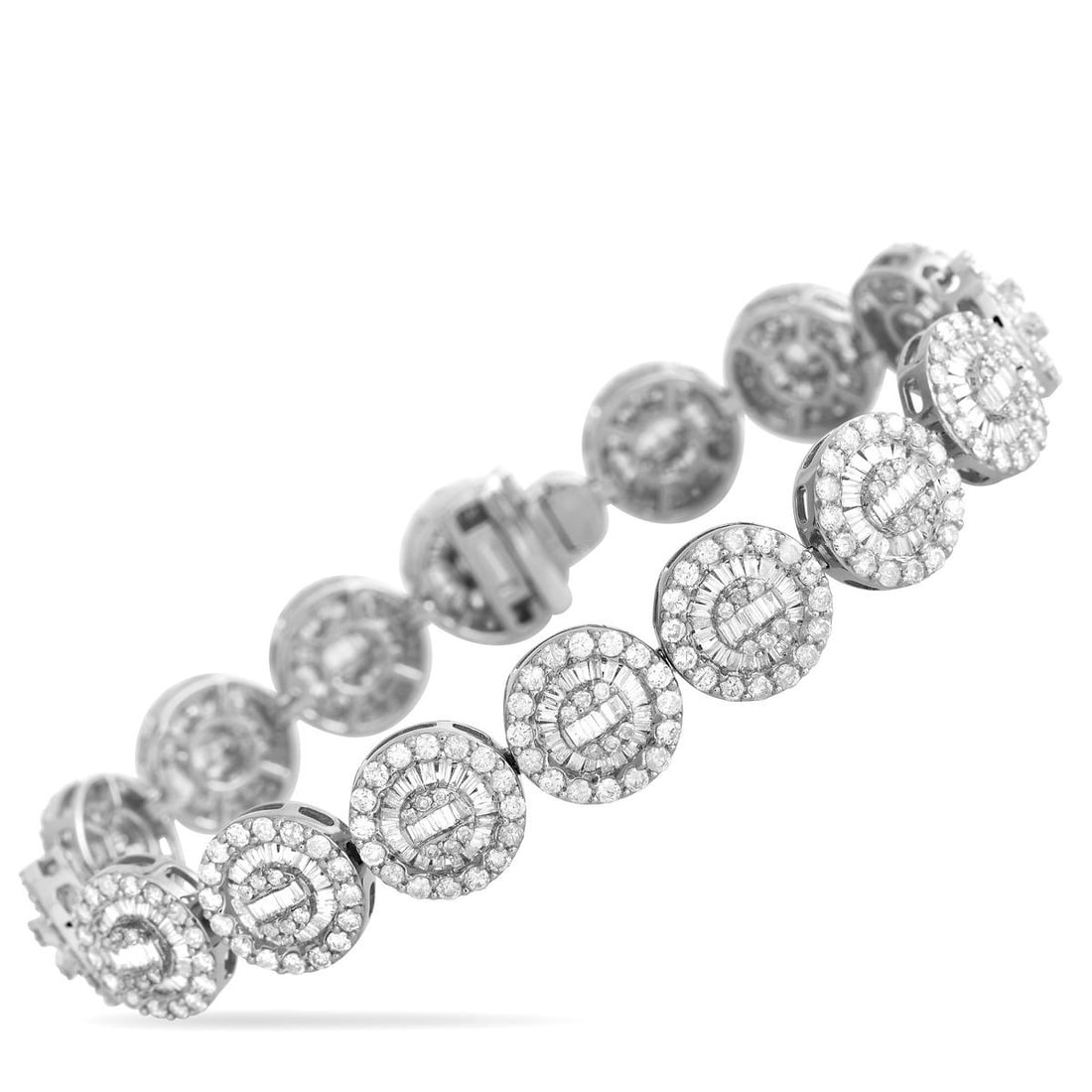 14K WHITE GOLD 7.30CT DIAMOND BRACELET: This luxury bracelet is undeniably breathtaking. Crafted from opulent 14K white gold, a series of circular links come to life thanks to a dazzling arrangement of diamonds with a total weight of 7.30 c