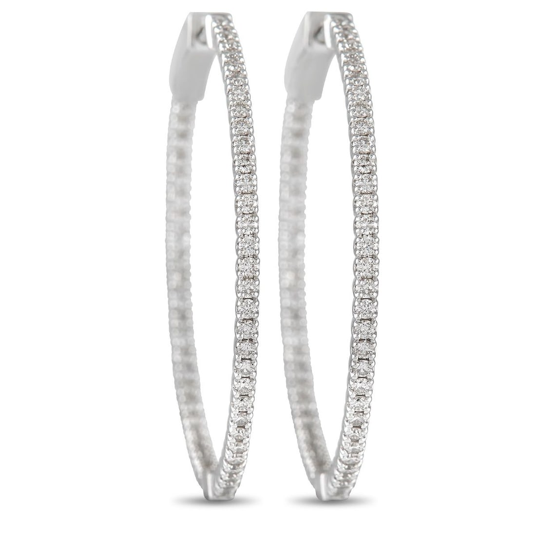 14K WHITE GOLD 1.34CT DIAMOND INSIDE-OUT HOOP EARRINGS: No luxury jewelry collection is complete without a pair of diamond hoop earrings. Each one of these exquisite earrings features a shimmering 14K White Gold setting that measures 1.5 round. Diamonds wi