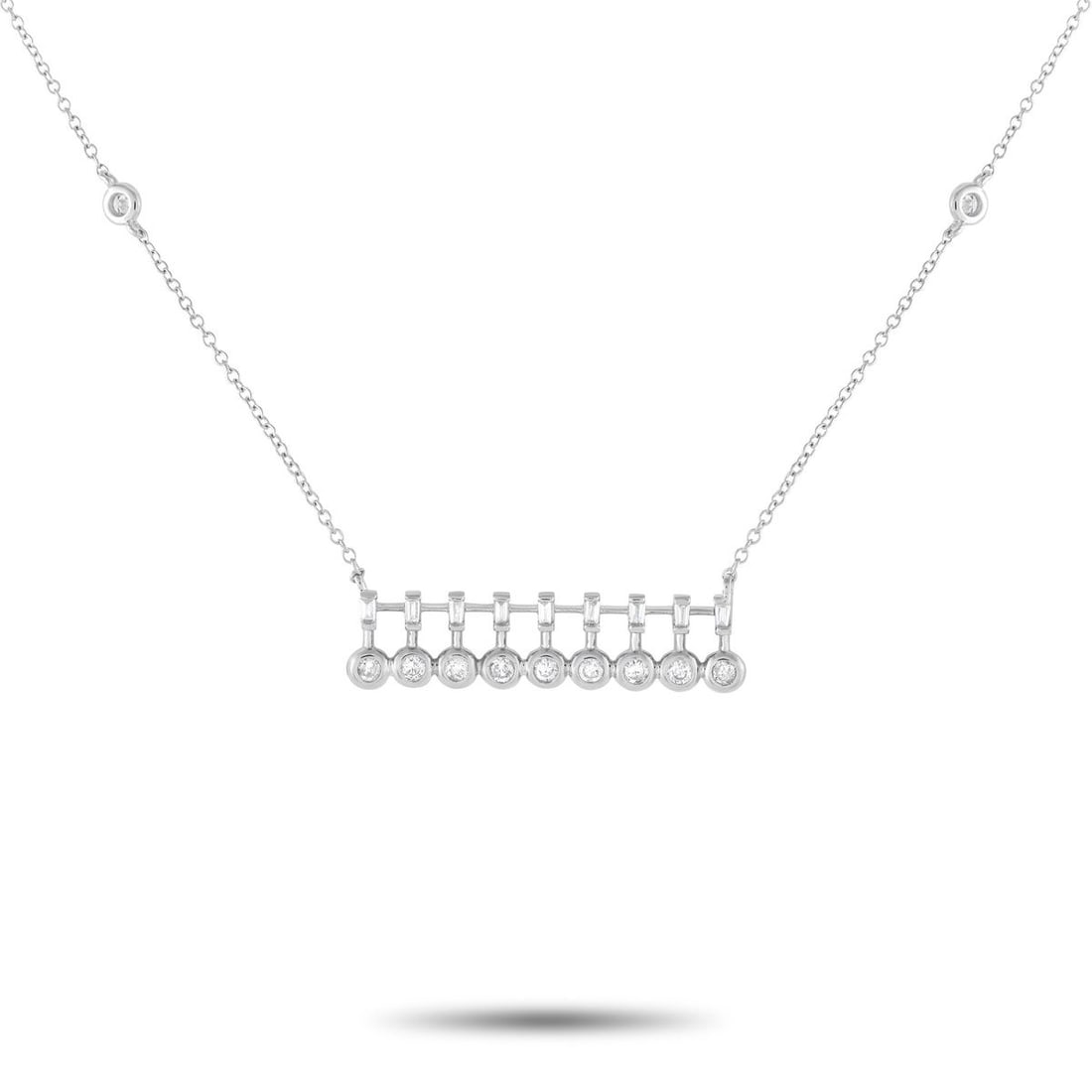 14K WHITE GOLD 0.25CT DIAMOND BAR NECKLACE: A glittering jewel you can effortlessly take from office to dinner. This trendy piece features a 15 long chain with two bezel-set round diamond stations and a lobster clasp. It holds a horizontal pend