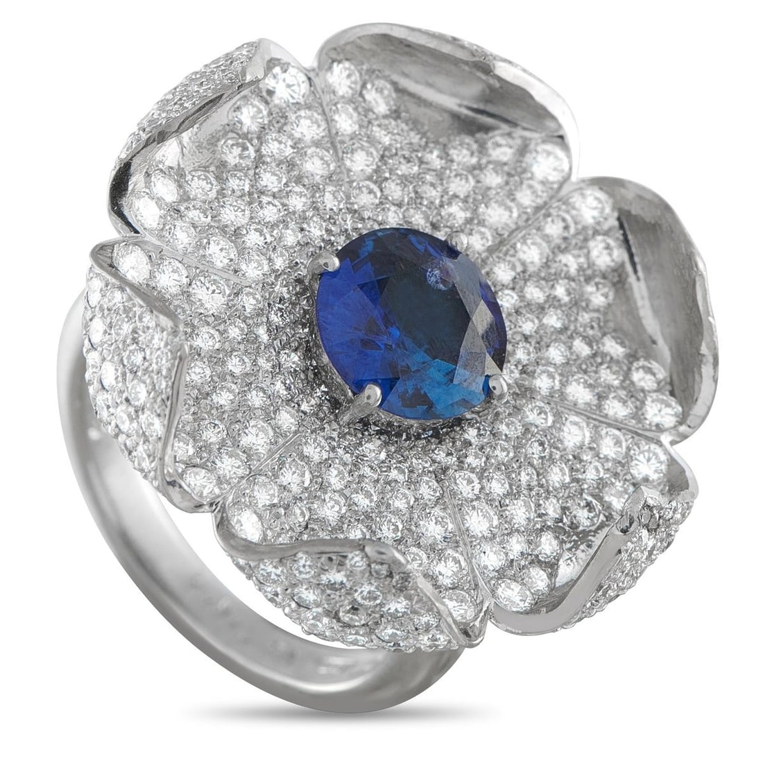 PLATINUM 2.50CT DIAMOND AND SAPPHIRE FLOWER RING: This elegant ring pairs enduring opulence with a feminine floral motif. Incredibly dramatic, an array of inset Diamonds totaling 2.50 carats are present on both sides of the curved Platinum setting. A