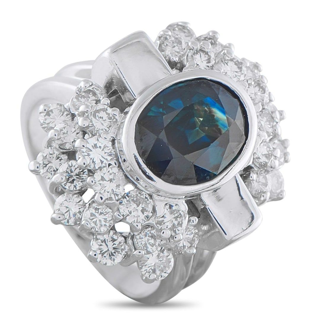 18K WHITE GOLD 1.92CT DIAMOND AND SAPPHIRE RING: A unique 18K White Gold setting makes this luxury ring unlike anything youve seen before. At the center, a 4.0 carat Sapphire adds a sophisticated pop of color. Clusters of Diamonds with a total weigh