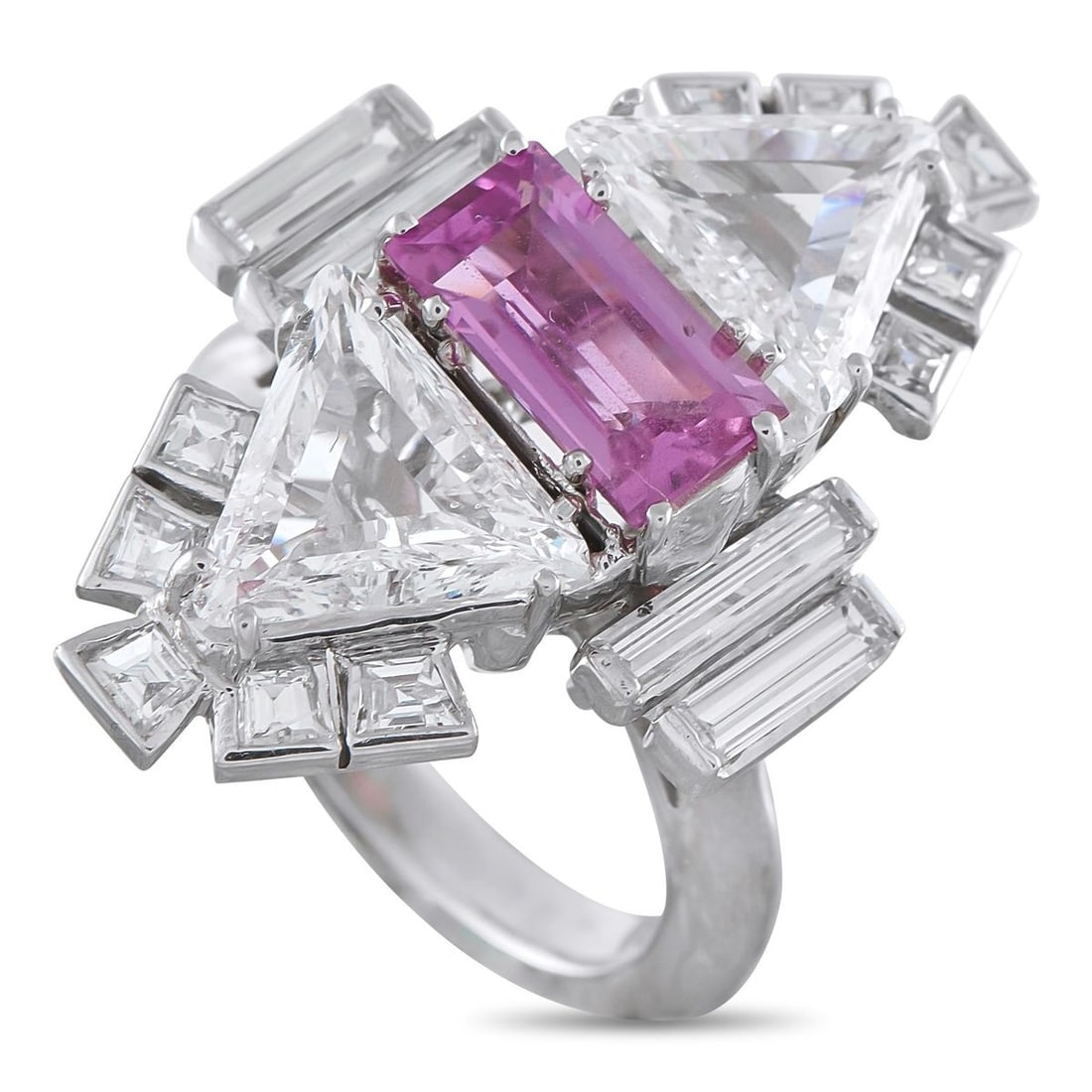PLATINUM 4.20CT DIAMOND AND SAPPHIRE RING: Bright in tone, but arranged with intent. A 2.10-carat pink sapphire is set east-west at the center, followed by trillion-cut diamonds above and below. From the trillion diamonds, trapezoid-cut diamon