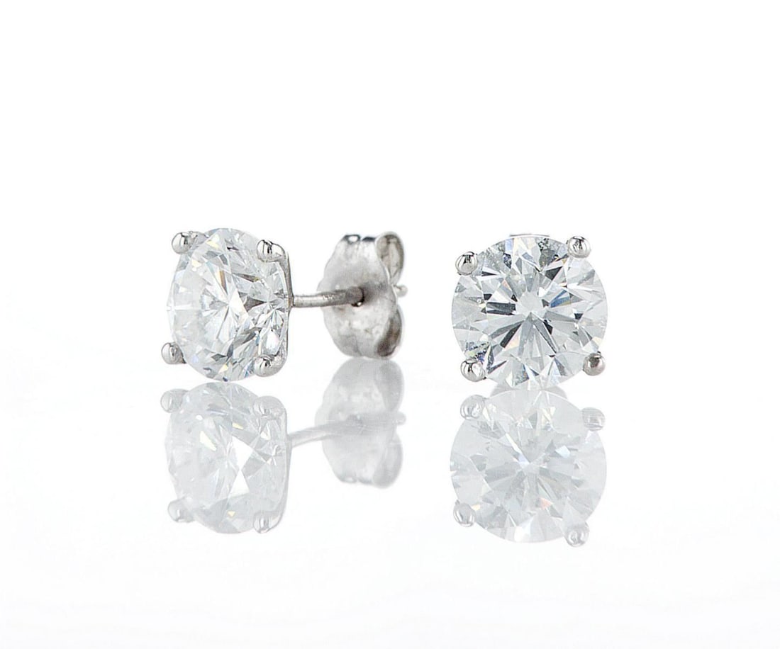 14kt White Gold 3.02ctw Diamond Earrings: Jewelry Description Description: One pair of 14k white gold earrings, set with lab grown diamonds. Jewelry Weight: 1.38 Grs Total Diamonds Weight: 3.02 Cts Precious Metal: 14kt White Gold Certificate 