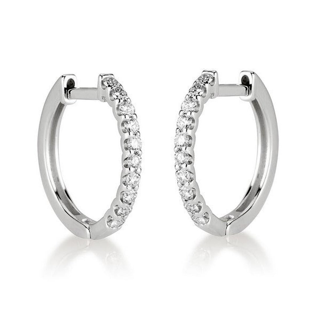 14kt White Gold 0.6ctw Diamond Earrings: One pair of 14k white gold earrings Jewelry Weight: 4Grs Total Diamonds Weight: 0.6Cts Main Stones Description: Quantity: 20 Cut and shape: Round Carats Weight: 0.6 Clarity: VS Color: F DSL Appraised.