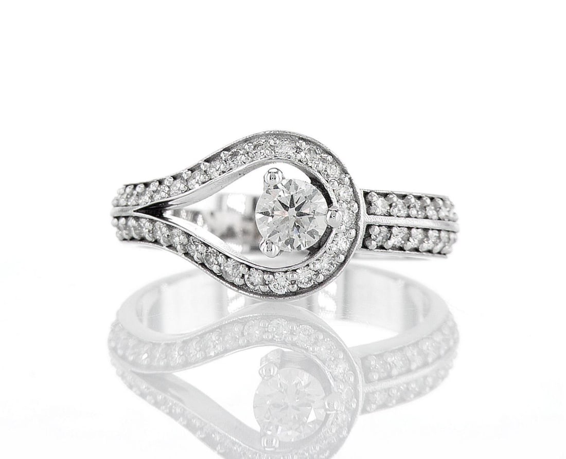 14kt White Gold 0.8ctw Diamond Ring: Jewelry Description Description: One 14k white gold ring, set with natural diamonds. Jewelry Weight: 4.24 Grs Total Diamonds Weight: 0.8 Cts Precious Metal: 14kt White Gold Certificate Number: DSL- 44