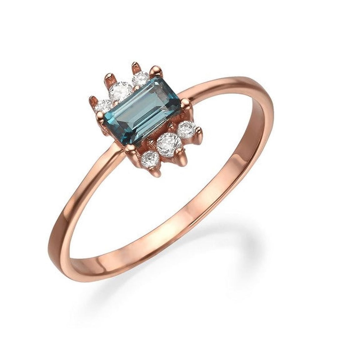 14kt Rose Gold 0.2ctw Diamond Ring: One 14k rose gold ring, set with natural diamond. Jewelry Weight: 1.7Grs Total Diamonds Weight: 0.2Cts Main Stones Description: Quantity: 1 Cut and shape: Octagon Carats Weight: 0.2 Color: Blue Corund