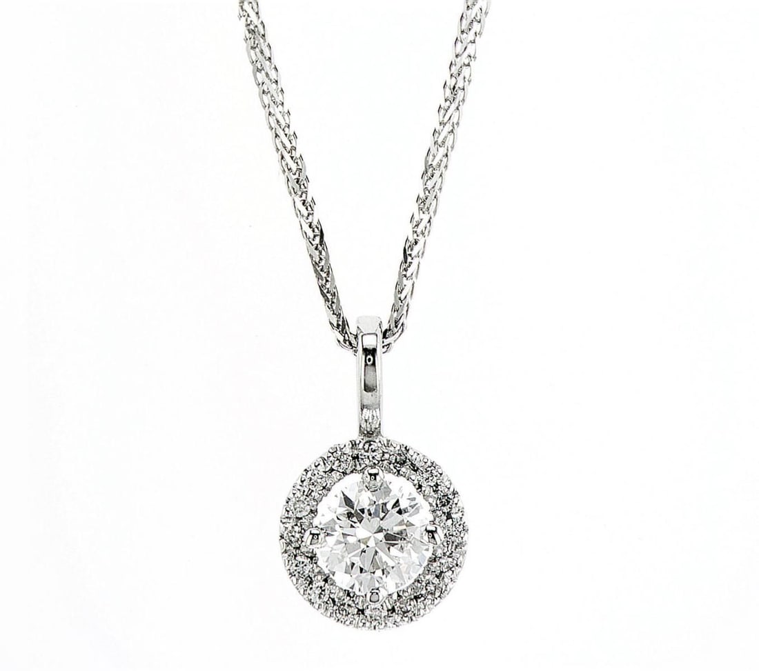 14kt White Gold 0.6ctw Diamond Pendant: One 14k white gold pendant with chain, set with one center lab grown diamond and small lab grown diamonds around. Jewelry Weight: 2.31Grs Total Diamonds Weight: 0.6Cts Main Stones Description: Quantit