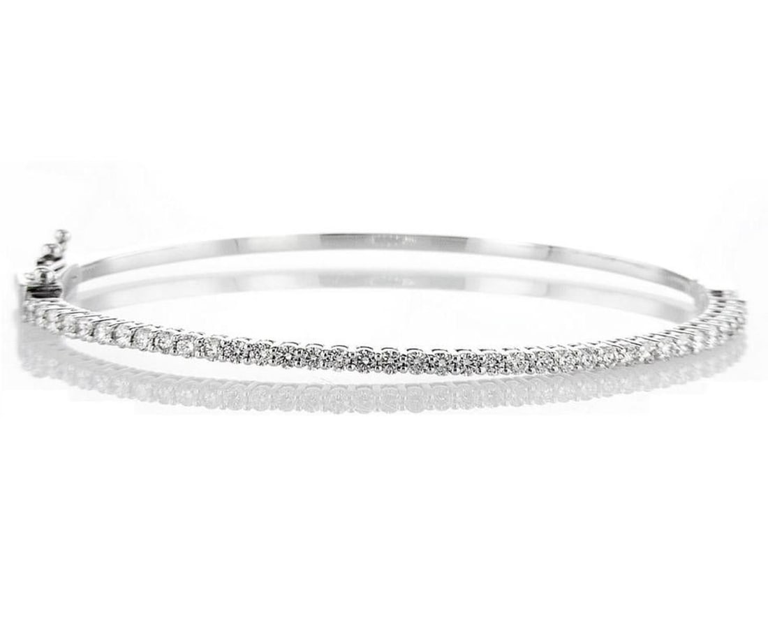 14kt White Gold 1.27ctw Diamond Bracelet: Jewelry Description Description: One 14k white gold bracelet, set with lab grown diamonds. Jewelry Weight: 9.19 Grs Total Diamonds Weight: 1.27 Cts Precious Metal: 14kt White Gold Certificate Number: 
