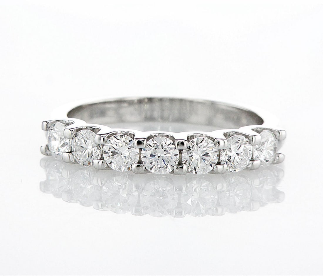 14kt White Gold 1ctw Diamond Ring: One 14k white gold ring (14k stamped), set with lab grown diamonds. Jewelry Weight: 2.03Grs Total Diamonds Weight: 1Cts Main Stones Description: Quantity: 7 Cut and shape: Round Brilliant Carats Weigh