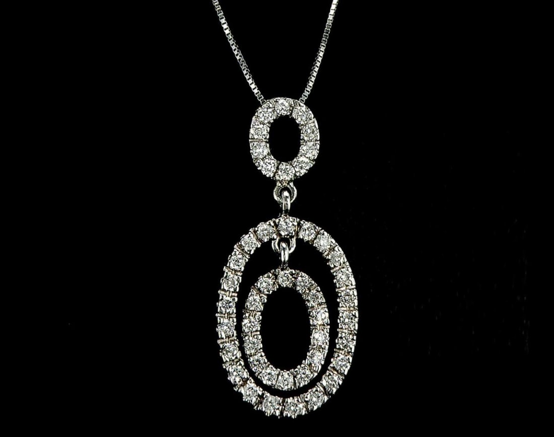 14kt White Gold 0.92ctw Diamond Pendant: One 14k white gold pendant (14k stamped), set with small natural diamonds. Jewelry Weight: 3.27Grs Total Diamonds Weight: 0.92Cts Main Stones Description: Cut and shape: Round Brilliant Carats Weight: