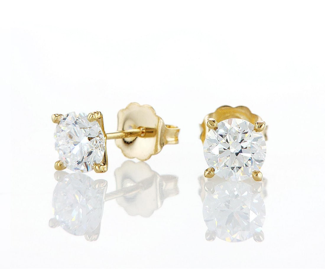 14kt Yellow Gold 1.4ctw Diamond Earrings: Jewelry Description Description: One 14k yellow gold earrings, set with lab grown diamonds. Jewelry Weight: 0.96 Grs Total Diamonds Weight: 1.4 Cts Precious Metal: 14kt Yellow Gold Certificate Number: