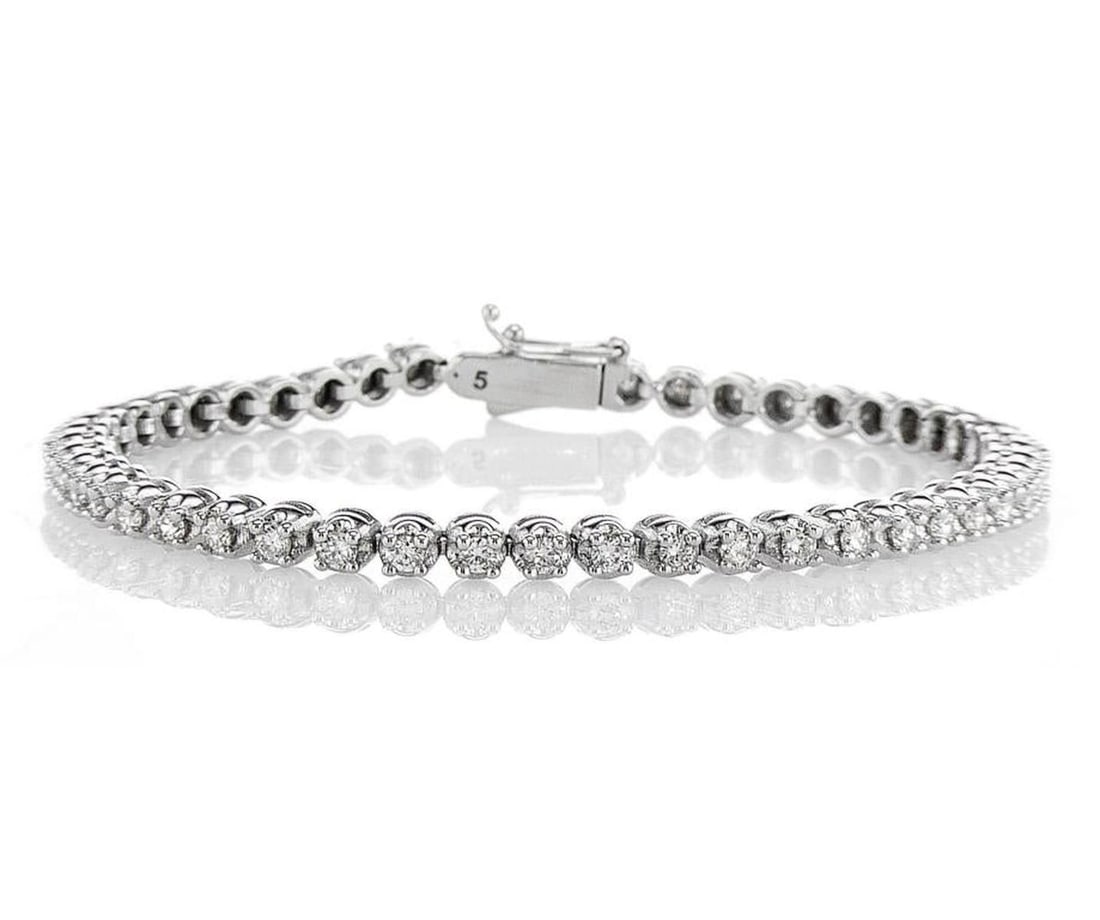 14kt White Gold 1.96ctw Diamond Bracelet: Jewelry Description Description: One 14k white gold bracelet, set with natural diamonds. Jewelry Weight: 11.2 Grs Total Diamonds Weight: 1.96 Cts Precious Metal: 14kt White Gold Certificate Number: DS
