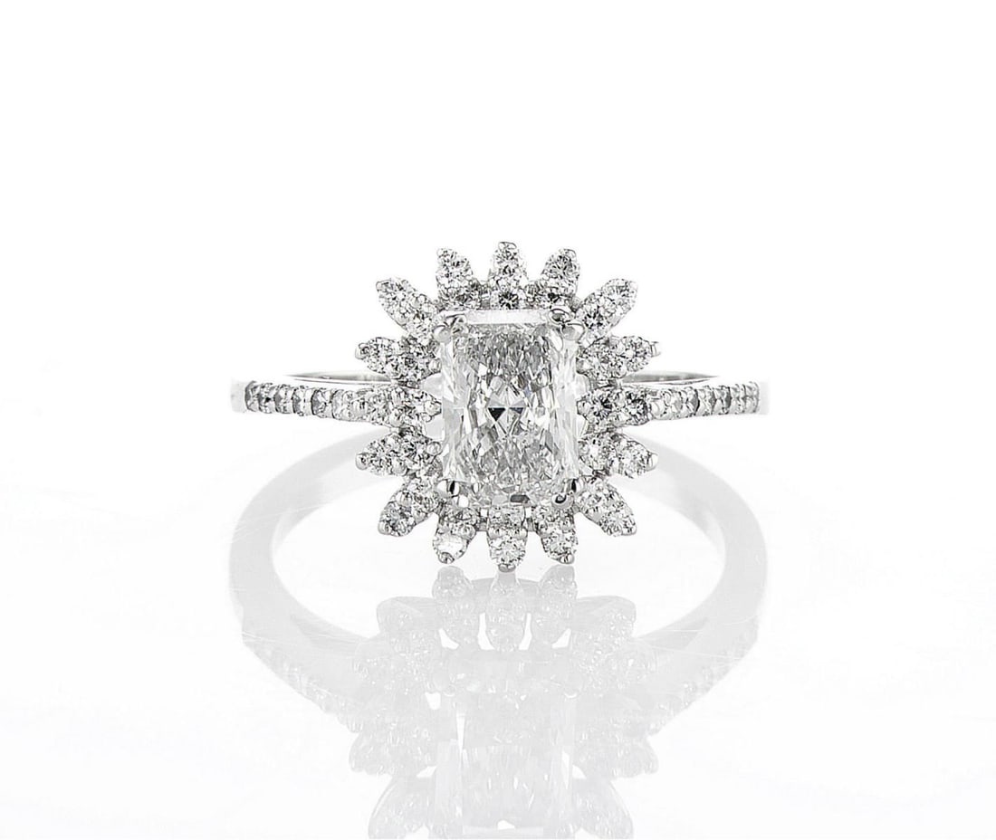 14kt White Gold 1.48ctw Diamond Ring: One 14k white gold ring, set with lab grown diamond. Jewelry Weight: 3.46Grs Total Diamonds Weight: 1.48Cts Main Stones Description: Quantity: 1 Cut and shape: Radiant Carats Weight: 1.02 Clarity: VS1