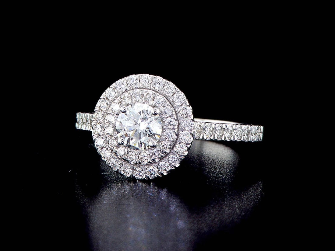 14kt White Gold 1.56ctw Diamond Ring: Jewelry Description Description: One 14K white gold ring (14K stamped), set with one center natural diamond and small natural diamonds around and on the sides. Jewelry Weight: 2.85 Grs Total Diamonds 