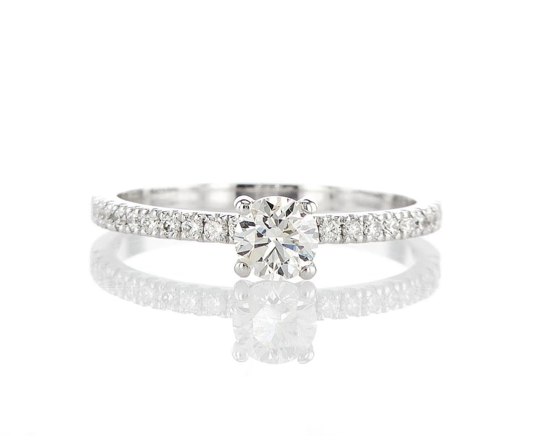 14kt White Gold 0.6ctw Diamond Ring: One 14k white gold ring, set with natural diamond. Jewelry Weight: 1.72Grs Total Diamonds Weight: 0.6Cts Main Stones Description: Quantity: 1 Cut and shape: Round Brilliant Carats Weight: 0.4 Clarity:
