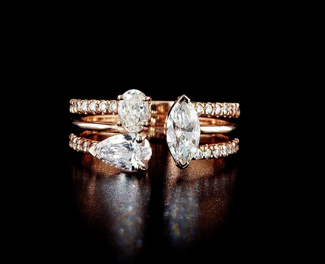 14kt Rose Gold 1.08ctw Diamond Ring: One 4.34 gr. 14kt Rose Gold Diamond Ring Jewelry Weight: 4.34Grs Total Diamonds Weight: 1.08Cts Main Stones Description: Quantity: 1 Cut and shape: Oval Carats Weight: 0.3 Clarity: VS2 Color: G-H Side